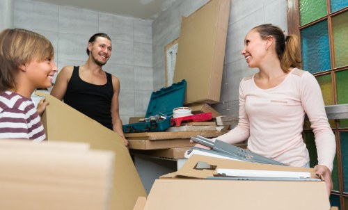 Worker handling storage items with care during operations